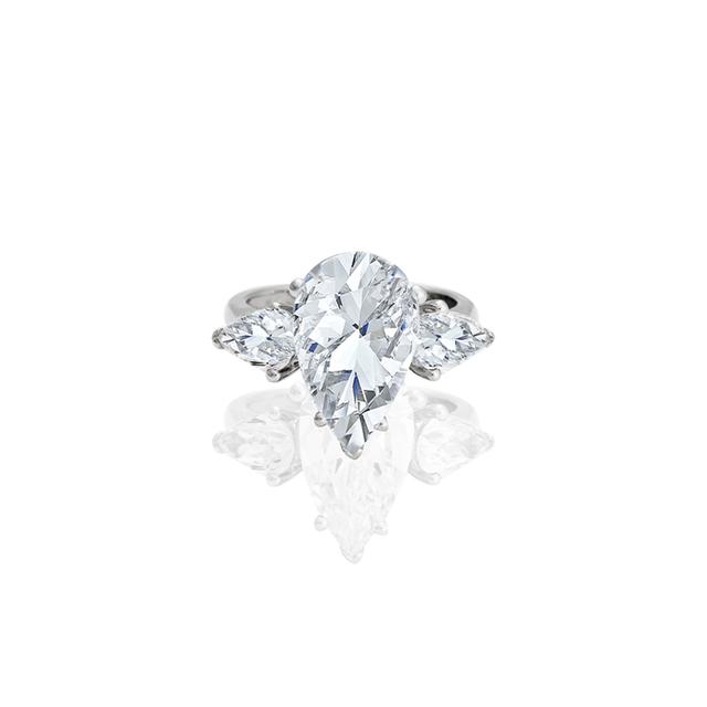 Naina Gold Pear Center Accent Engagement Ring